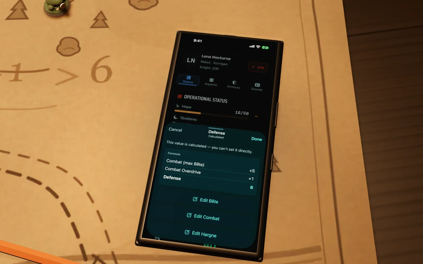 A phone up close on the table, showing how a defense total is calculated.